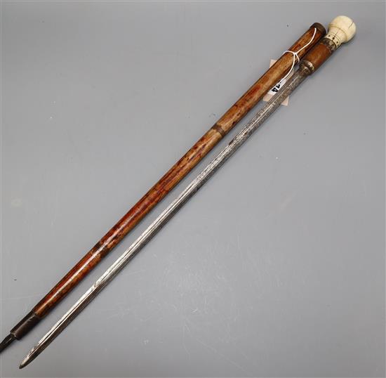 An 18th century French bone handled swordstick with engraved blade overall length 80cm